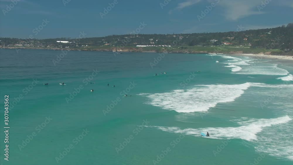 Aerial flying over the seaside beach of Carmel. Holiday makers are on the beach. California, USA. 25 April 2019 Aerial flying over the seaside beach of Carmel. Holiday makers are on the beach. California, USA. 25 April 2019