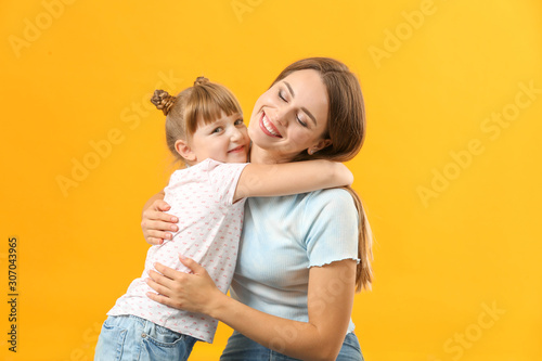 Portrait of happy mother an...