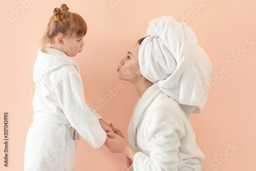 Portrait of happy mother an...