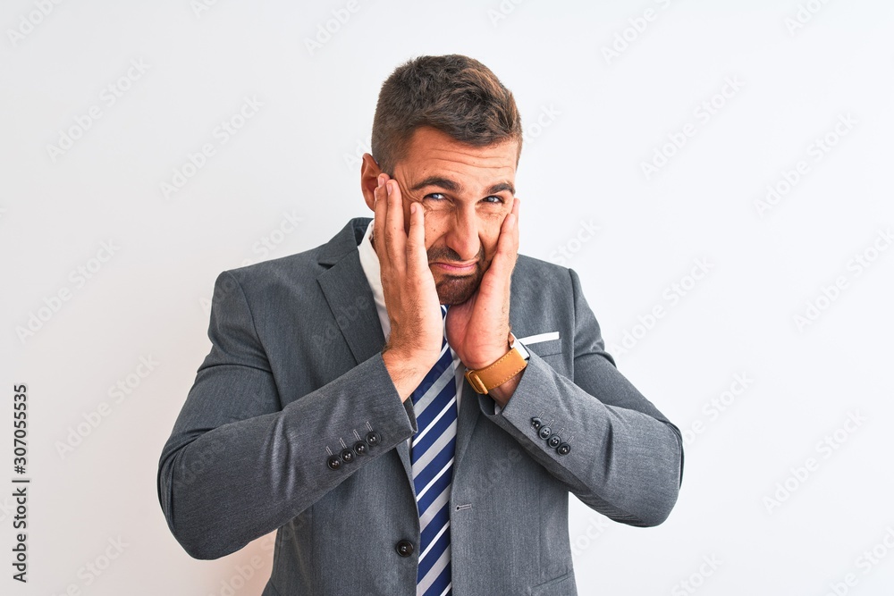 Young handsome business man wearing suit and tie over isolated background Tired hands covering face, depression and sadness, upset and irritated for problem Young handsome business man wearing suit and tie over isolated background Tired hands covering face, depression and sadness, upset and irritated for problem