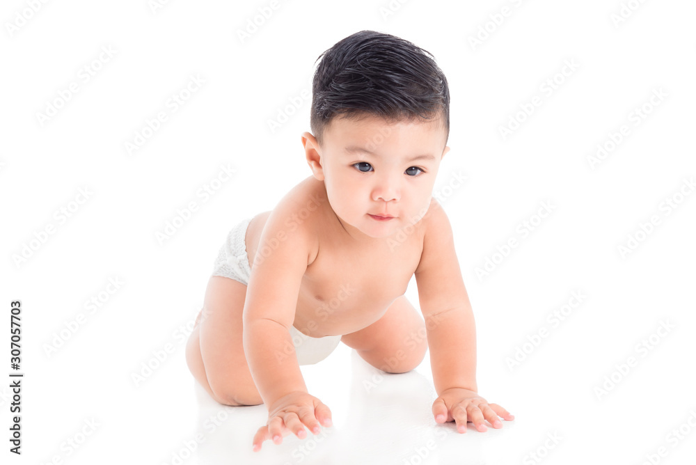 Little asian male toddler wearing diaper crawling on the floor over white background Little asian male toddler wearing diaper crawling on the floor over white background