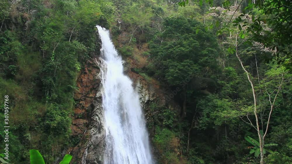 Close up view of flowing waterfall in the national park at Chiangrai, northern of Thailand Close up view of flowing waterfall in the national park at Chiangrai, northern of Thailand