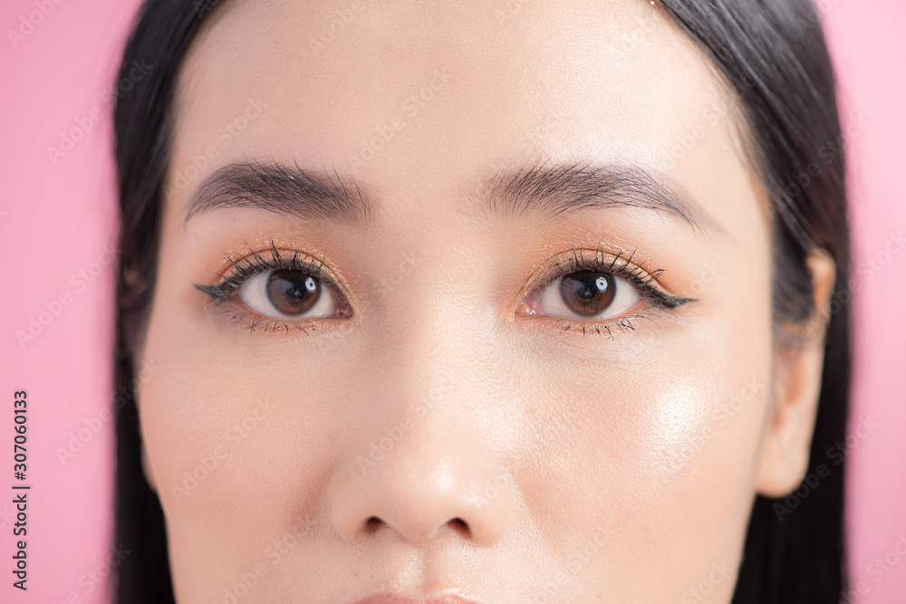 Beautiful female eyes on pink background Beautiful female eyes on pink background