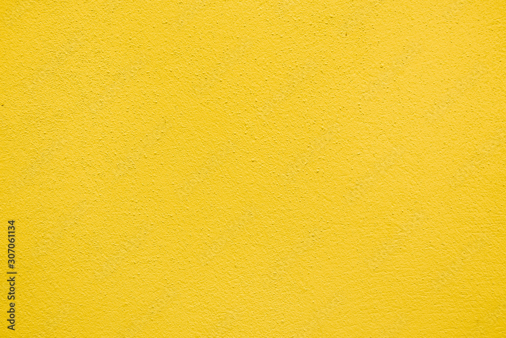 Colour yellow paint on concrete texture. cement wall surface. Banner backdrop interior design or add text message background. Colour yellow paint on concrete texture. cement wall surface. Banner backdrop interior design or add text message background.