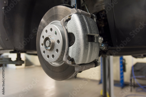 Car brake caliper close-up. Front brakes of a modern car. technical photography.