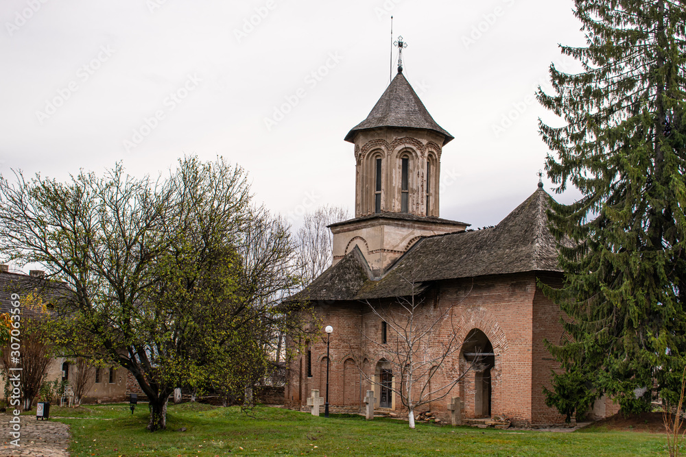 View of beautiful, old monastery in Targoviste, Romania, on a cloudy autumn day