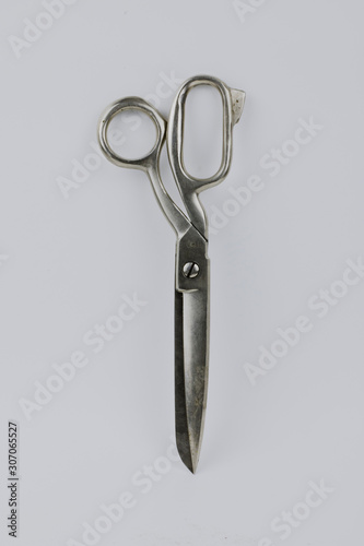 metal tailors scissors on a white background photo