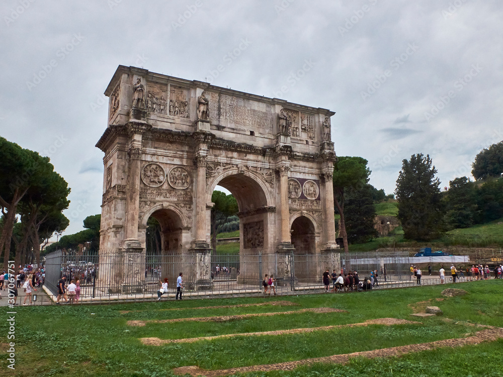 Tourists around triumphal arch. Rome, Italy Tourists around triumphal arch. Rome, Italy
