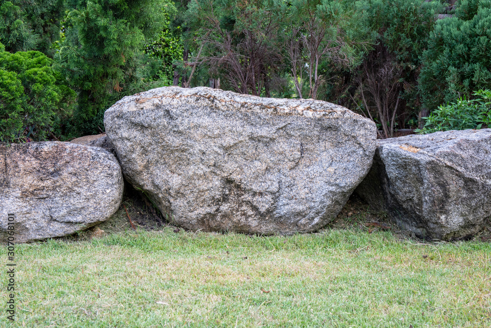 Big rock or stone in the garden.