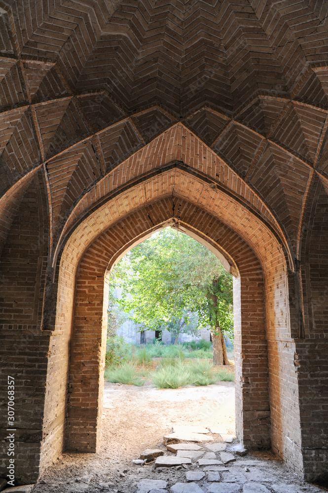 The arch and gates of the ancient Asian traditional ornament. The details of the architecture of medieval Central Asia