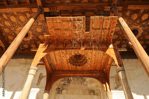 The ceiling in the form of a dome in a traditional ancient Asian mosaic. The details of the architecture of medieval Central Asia
