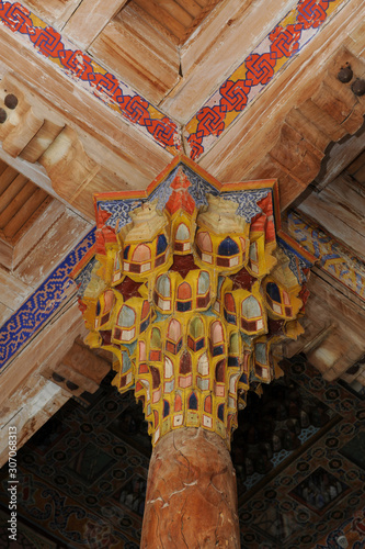 The ceiling in the form of a dome in a traditional ancient Asian mosaic. The details of the architecture of medieval Central Asia
