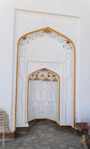 The arch and gates of the ancient Asian traditional ornament. The details of the architecture of medieval Central Asia