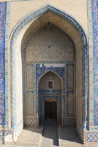 The arch and gates of the ancient Asian traditional ornament. The details of the architecture of medieval Central Asia