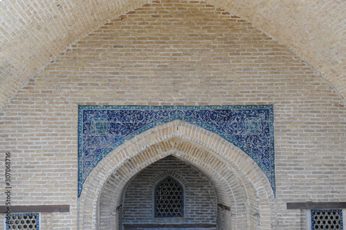 The arch and gates of the ancient Asian traditional ornament. The details of the architecture of medieval Central Asia