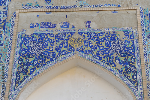 The arch and gates of the ancient Asian traditional ornament. The details of the architecture of medieval Central Asia