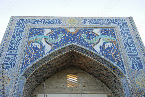 The arch and gates of the ancient Asian traditional ornament. The details of the architecture of medieval Central Asia