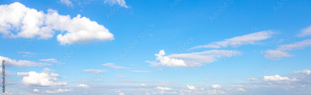Obraz premium Panorama or panoramic photo of blue sky and white clouds or cloudscape.