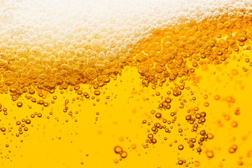 Beer background with bubble froth texture foam pouring alcohol soda in glass happy celebration party holiday new year concept object design