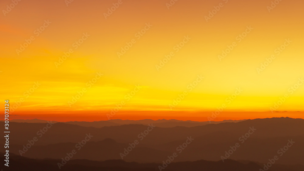 Fototapeta premium Panorama photo of sunset or evening time over mountain forest