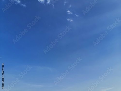 Blue sky with white clouds.