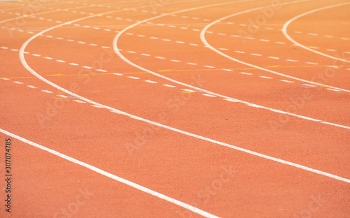 The curved lane in running track or athlete track in stadium. Running track is a rubberized artificial running surface for track and field athletics.