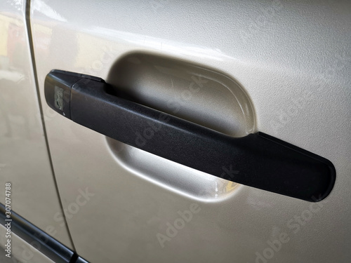 Close up of car door handle.