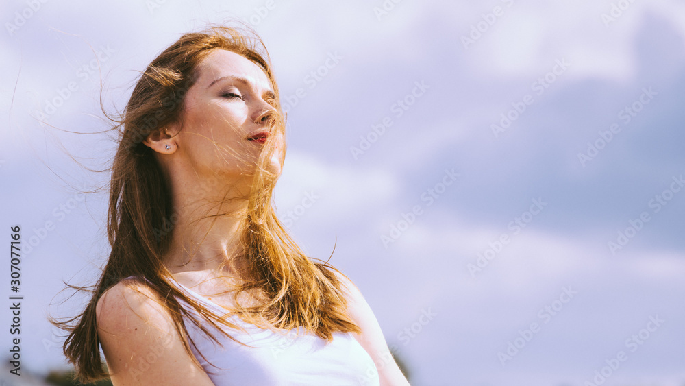 Girl relaxing outdoor enjoying sunlight Girl relaxing outdoor enjoying sunlight