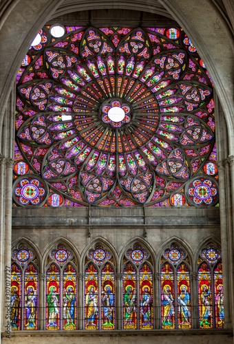  Colorful stained glass windows in Troyes Cathedral dedicated to Saint Peter and Saint Paul. France.