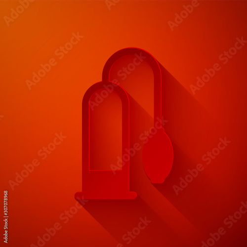 Paper cut Penis pump icon isolated on red background. Penis enlarger. Sex toy for men. Vacuum pump with a blower to increase the penis. Paper art style. Vector Illustration