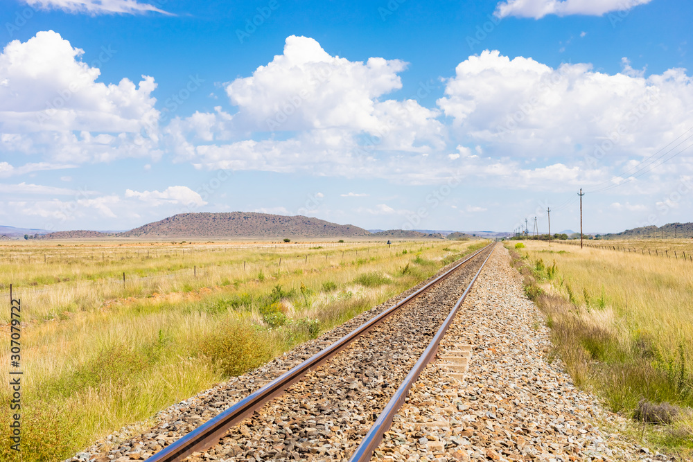 railway track in countryside rural farmland area of South Africa railway track in countryside rural farmland area of South Africa