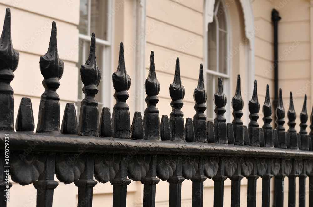 wrought iron fence at victorian building in London