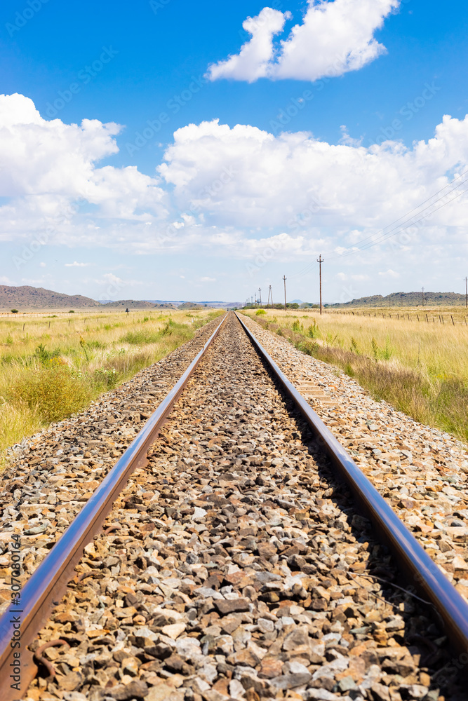 railway track in countryside rural farmland area of South Africa railway track in countryside rural farmland area of South Africa