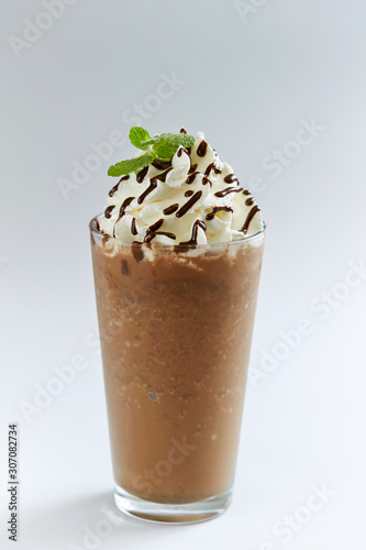 Фотография Chocolate frappuccino with whipped cream and chocolate sauce