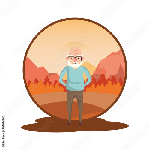cute grandfather in the sunset landscape