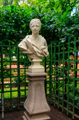 Marble bust of roman senator Marcellus Mark Claudius in old city park Summer Garden in St. Petersburg, Russia