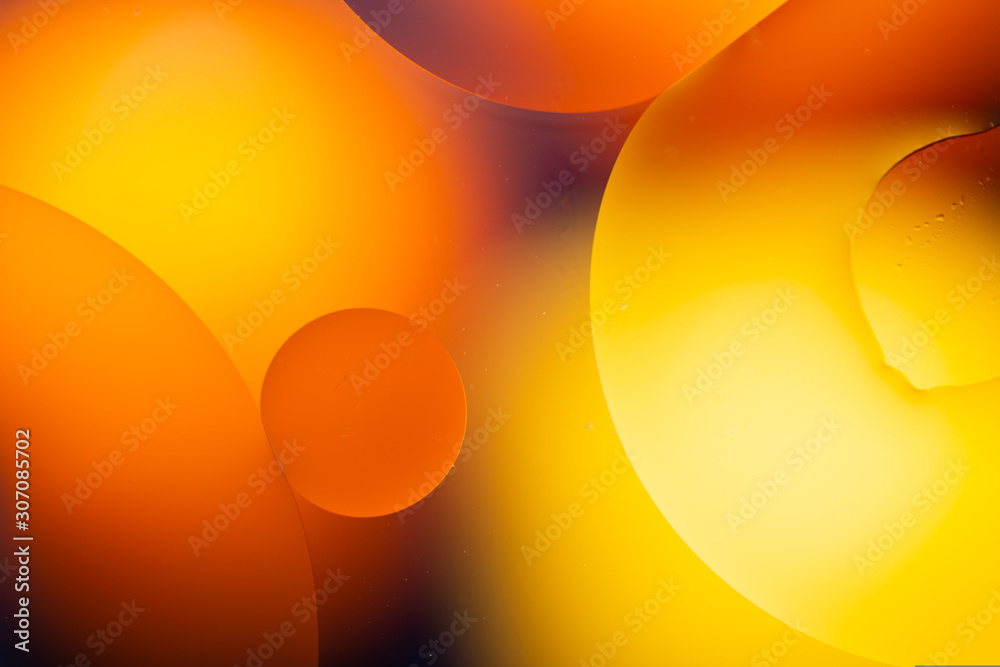 Close-up water and oil abstract in a rainbow lighting effect Close-up water and oil abstract in a rainbow lighting effect