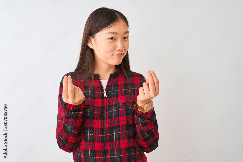 Young chinese woman wearing casual jacket standing over isolated white background doing money gesture with hands, asking for salary payment, millionaire business Young chinese woman wearing casual jacket standing over isolated white background doing money gesture with hands, asking for salary payment, millionaire business