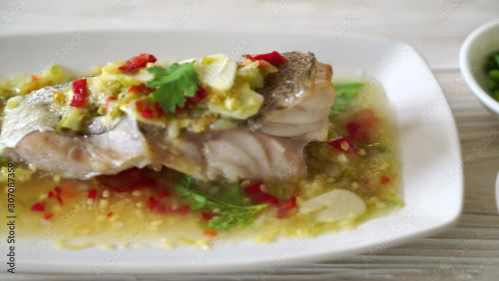 Steamed Grouper Fish Fillet with Chili Lime Sauce in lime dressing Steamed Grouper Fish Fillet with Chili Lime Sauce in lime dressing