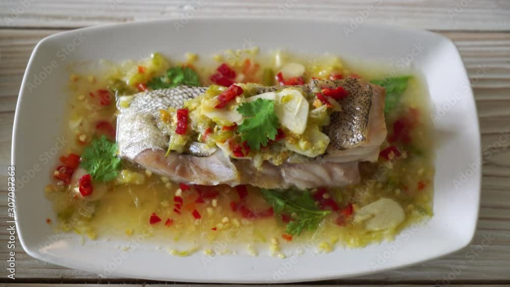 Steamed Grouper Fish Fillet with Chili Lime Sauce in lime dressing Steamed Grouper Fish Fillet with Chili Lime Sauce in lime dressing