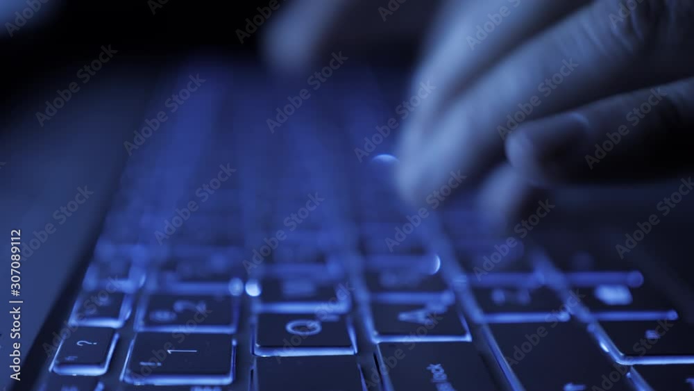 Man Writes Message to Social Network. Computer Hacker Typing Code Virus PC on Keyboard Late Night Working. Journalist Writes Article in Media. Working on Laptop, Typing on Keyboard, Modern Business.