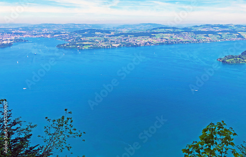 View of the Lake Luzerne or Vierwaldstättersee (Vierwaldstaettersee oder Vierwaldsattersee) from the Bürgenberg mountain, Obbürgen (Obburgen or Obbuergen) - Canton of Nidwalden, Switzerland photo