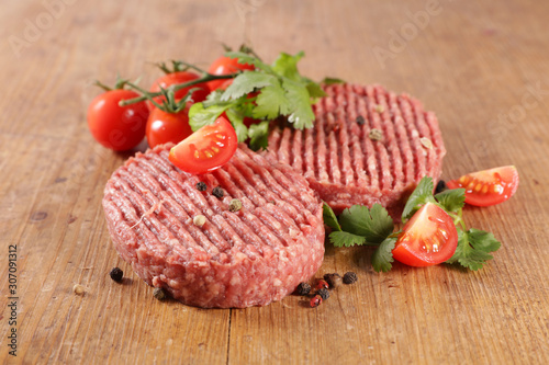 raw minced beef with herb and tomato- beefsteak