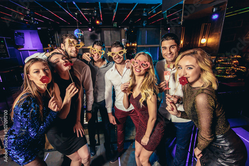 Young people dancing in night club