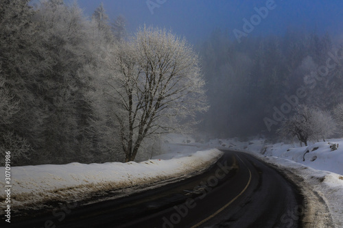 Misty morning among beautiful winter mountains © yanosh_nemesh