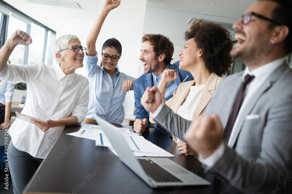 Successful business group of people at work in office Successful business group of people at work in office