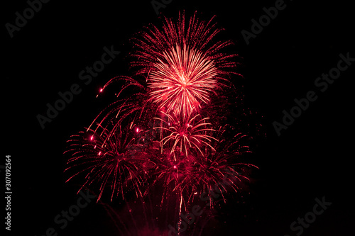 Red fireworks on black background for winter and new year festivals