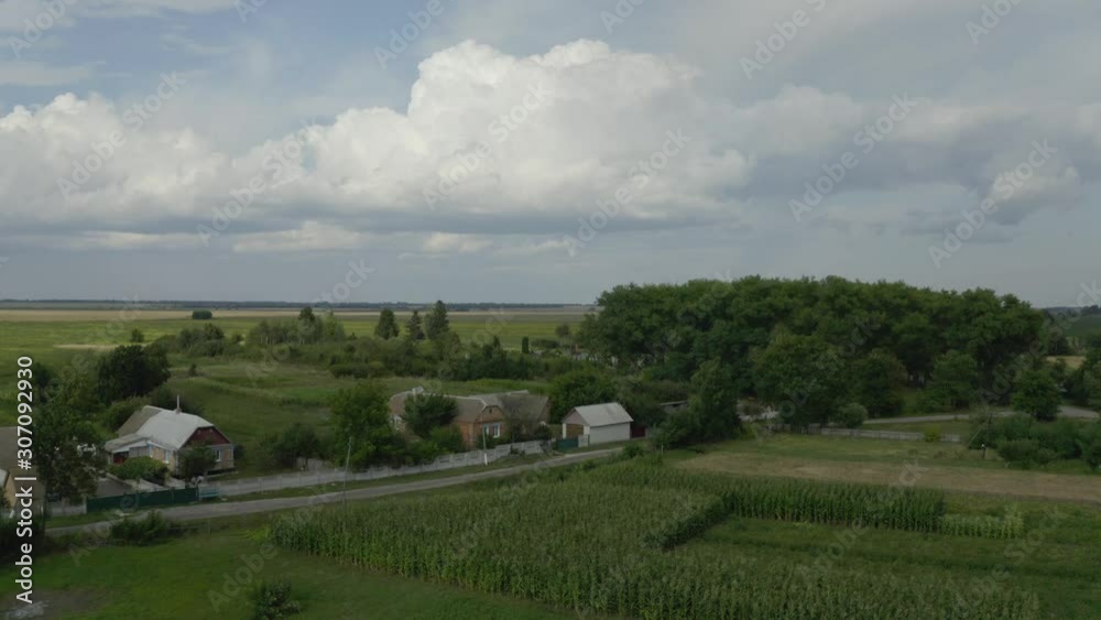 The Beautiful and Peaceful City With Glorious Trees, Different Houses, and Cloudy Blue Sky in Ukraine - Aerial Shot The Beautiful and Peaceful City With Glorious Trees, Different Houses, and Cloudy Blue Sky in Ukraine - Aerial Shot