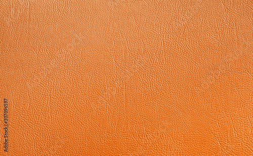 Orange elegance leather texture for background with visible details © photolink