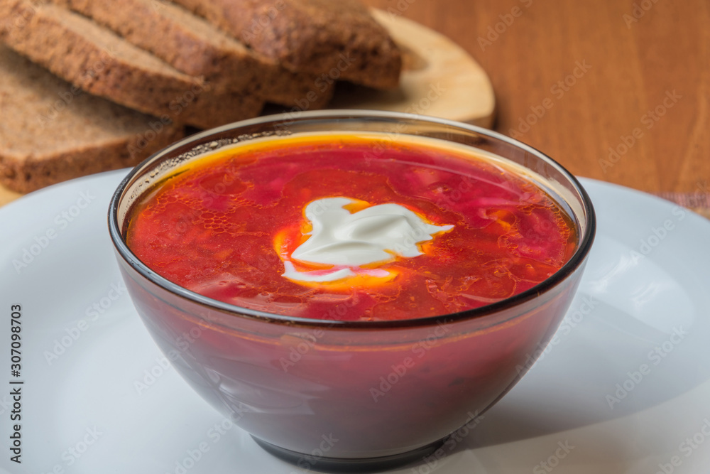 Borscht with sour cream on the table Borscht with sour cream on the table